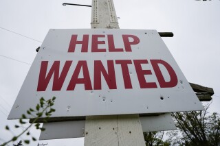 File - A help wanted sign is posted in Lansdale, Pa., Friday, April 28, 2023. On Thursday, the Labor Department reports on the number of people who applied for unemployment benefits last week. (AP Photo/Matt Rourke, File)