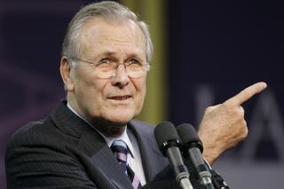 FILE - In this Nov. 9, 2006, file photo, Defense Secretary Donald Rumsfeld asks for another question following his Landon Lecture at Kansas State University in Manhattan, Kan. News of the death of former U.S. Defense Secretary Donald Rumsfeld has hit far differently in Baghdad than in the U.S. capital. Rumsfeld, whose service under four U.S. presidents was stained by the ruinous U.S.-led invasion of Iraq, died on Wednesday, June 30, 2021. (AP Photo/Orlin Wagner)