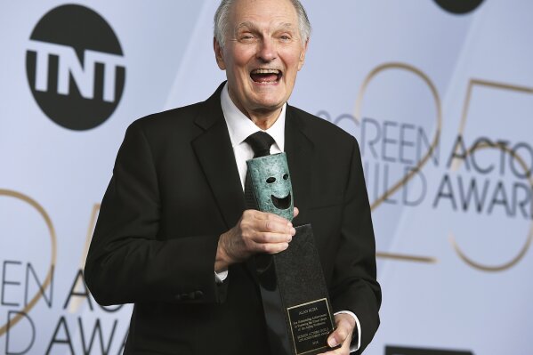 
              Alan Alda poses with the Life Achievement Award in the press room at the 25th annual Screen Actors Guild Awards at the Shrine Auditorium & Expo Hall on Sunday, Jan. 27, 2019, in Los Angeles. (Photo by Jordan Strauss/Invision/AP)
            