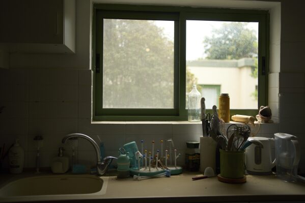 The kitchen of the home of Omri Miran, who is held captive by Hamas in the Gaza Strip, is frozen in time since his Oct. 7, 2023 abduction in Kibbutz Nahal Oz, southern Israel, seen on Wednesday, April 9, 2025. (AP Photo/Maya Alleruzzo)