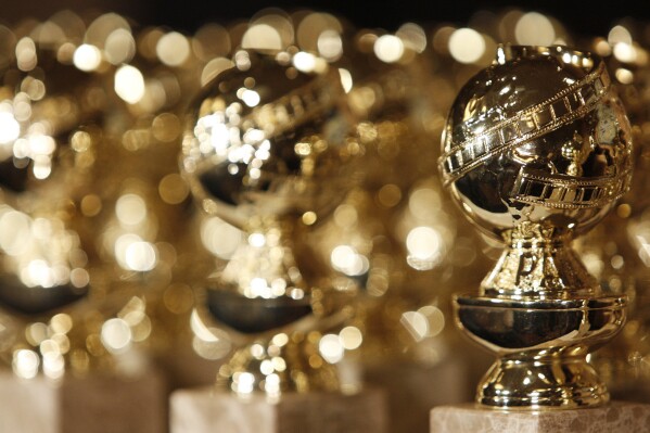 FILE - In this Jan.. 6, 2009, file photo, Golden Globe statuettes are seen during a news conference at the Beverly Hilton Hotel in Beverly Hills, Calif. The 2024 Golden Globe Awards will be broadcast on CBS. (AP Photo/Matt Sayles, File)