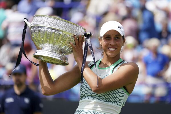 USA's Madison Keys with the winner's trophy as she celebrates winning the Women's singles final match against Russia's Daria Kasatkina on day eight of the Rothesay International Eastbourne at Devonshire Park, Eastbourne, England, Saturday, July 1, 2023. (Gareth Fuller/PA via AP)