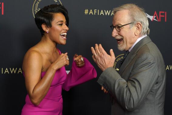 Ariana DeBose, left, and Steven Spielberg arrive at the AFI Awards Luncheon on Friday, March 11, 2022, at the Beverly Wilshire Hotel in Beverly Hills, Calif. (AP Photo/Chris Pizzello)