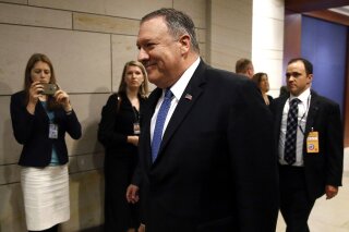 
              Secretary of State Mike Pompeo arrives at a classified briefing for members of Congress on Iran, Tuesday, May 21, 2019, on Capitol Hill in Washington. (AP Photo/Patrick Semansky)
            