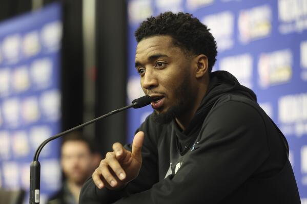 Cleveland Cavaliers' Donovan Mitchell addresses the media during the NBA All-Star basketball game media day Saturday, Feb. 18, 2023, in Salt Lake City. (AP Photo/Rob Gray)