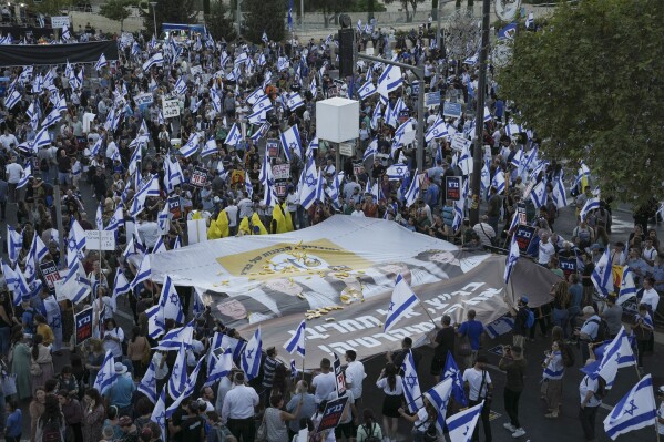Israelis support plans by Prime Minister Benjamin Netanyahu's government to overhaul the judicial system protest against Israel's Supreme Court in Jerusalem, Thursday, Sept. 7, 2023. Thousands supporting the Israeli government's judicial overhaul rallied in front of the Supreme Court Thursday, ahead of a pivotal hearing next week on the legality of the first major bill of the overhaul. (AP Photo/Mahmoud Illean)