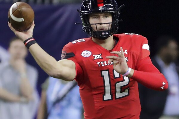 FILE - Texas Tech quarterback Tyler Shough passes the ball against Mississippi during the first half of the Texas Bowl NCAA college football game Dec. 28, 2022, in Houston. Texas Tech opens their season at Wyoming on Sept. 2.(AP Photo/Michael Wyke, File)