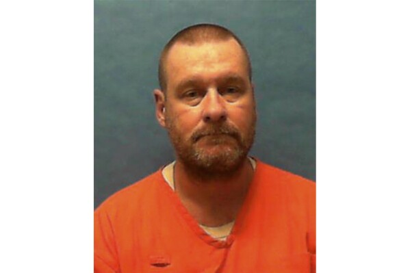 This booking photo provided by the Florida Department of Corrections shows Michael Duane Zack III. Zack, the man convicted of killing two women he met at beach bars in the Florida Panhandle in 1996, is set to be executed under a death warrant signed Thursday, Aug. 17, 2023, by Republican Gov. Ron DeSantis. (Florida Department of Corrections via AP)