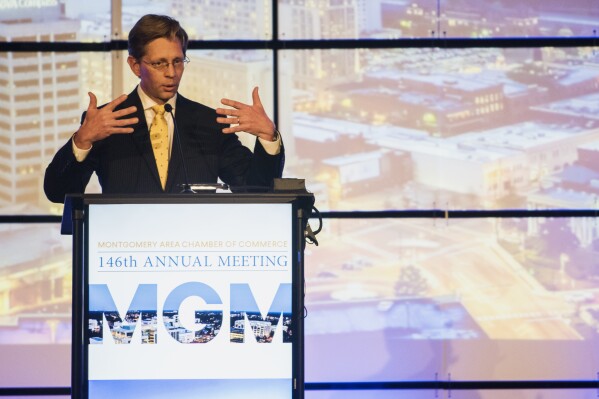 FILE -- Alabama State Superintendent Eric Mackey speaks during the Montgomery Area Chamber of Commerce annual meeting in Montgomery, Ala., Dec. 11, 2018. Mackey said on Thursday, Sept. 14, 2023 that 10,000 or more third-grade students could be held back from fourth grade this year after the Alabama State Board of Education voted on setting the reading test score required to advance. (Jake Crandall/The Montgomery Advertiser via AP, file)