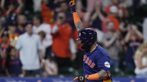 Houston Astros' Martin Maldonado celebrates after hitting a home run against the Seattle Mariners during the eighth inning of a baseball game Saturday, July 8, 2023, in Houston. (AP Photo/Kevin M. Cox)