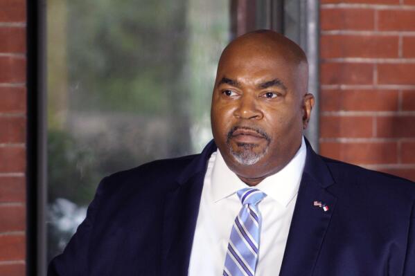 North Carolina Republican Lt. Gov. Mark Robinson listens during a news conference Tuesday, Oct. 12, 2021 in Raleigh, N.C. North Carolina Republican Lt. Gov. Mark Robinson on Tuesday again declined to apologize for remarks he made in June criticizing sexual education in public schools and likening gay and transgender people to “filth.”(AP Photo/Bryan Anderson)