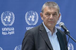 FILE - Philippe Lazzarini, Under-Secretary-General of the United Nations and Commissioner-General of the United Nations Relief and Works Agency for Palestine Refugees in the Near East (UNRWA) speaks during a news conference at their compound following a cease-fire reached after an 11-day war between Gaza's Hamas rulers and Israel, May 23, 2021, in Gaza City. Despite a dire warning from the U.N. chief that the U.N. agency for Palestinian refugees “is on the verge of financial collapse,” donors at a pledging conference on Friday, June 2, 2023, provided just $107 million in new funds — significantly less than the $300 million it needs to keep helping millions of people. (AP Photo/John Minchillo, File)