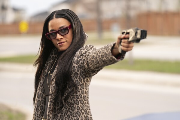 Love Hurts' review: Ke Huy Quan and Ariana DeBose lead action-comedy | AP  News