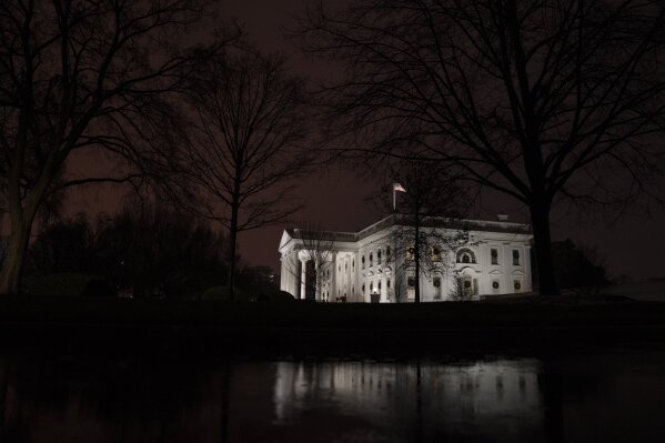 FILE - This Dec. 16, 2020, file photo shows a view of the White House in Washington. In the six weeks since his defeat by Biden, Trump has been increasingly disengaged from his job. (AP Photo/Evan Vucci, File)