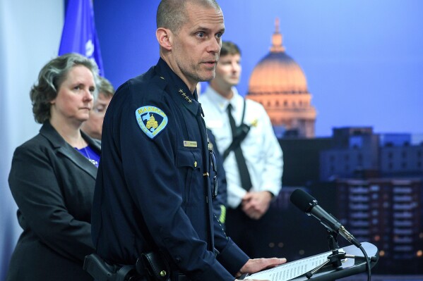 Madison Police Acting Chief John Patterson and Mayor Satya Rhodes-Conway, left, appear during a press conference to announce the arrest of Jeffrey Rupnow in Madison, Wis. Thursday, May 8, 2025. (John Hart/Wisconsin State Journal via AP)