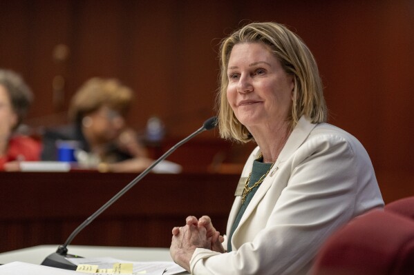 Georgia House Speaker Pro-Tempore Jan Jones, R-Milton, presents SB 233 to the House Education Committee in Atlanta, Wednesday, March 13, 2024. (Matthew Pearson/WABE via AP)