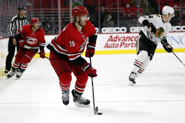 FILE - In this May 6, 2021, file photo, Carolina Hurricanes' Dougie Hamilton (19) skates with the puck against the Chicago Blackhawks during the third period of an NHL hockey game in Raleigh, N.C. Hamilton would be among the most coveted free agents. He's a 28-year-old right-shooting defenseman who can produce offensively. (AP Photo/Karl B DeBlaker, File)
