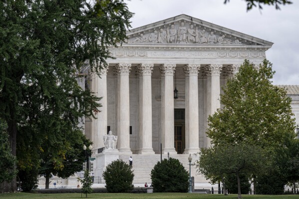 FILE - The Supreme Court is seen in Washington, Sept. 25, 2023. The Supreme Court is tackling the question of when public officials can block critics from commenting on their social media accounts. The justices are hearing arguments in two cases Tuesday, Oct. 31, involving lawsuits filed by people who were blocked after leaving critical comments on social media accounts belonging to school board members in southern California and a city manager in Port Huron, Michigan, northeast of Detroit. (AP Photo/J. Scott Applewhite, File)