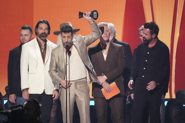 Old Dominion accept the award for group of the year during the 60th annual Academy of Country Music Awards on Thursday, May 8, 2025, in Frisco, Texas. (AP Photo/Chris Pizzello)