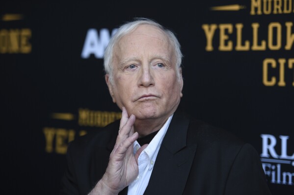 FILE - Richard Dreyfuss arrives at the Los Angeles premiere of "Murder at Yellowstone City" on Thursday June 23, 2022, at Harmony Gold Theater in Los Angeles. A venue issued an apology, Saturday, May 25, 2024, for comments made by Dreyfuss who showed up in a dress at a “Jaws”-themed event and made comments that were demeaning to women and the LGBTQ community. (Photo by Richard Shotwell/Invision/AP, File)