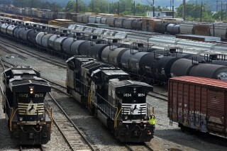 Norfolk Southern locomotives are moved in Norfolk Southern's Conway Terminal in Conway, Pa., Saturday, June 17, 2023. Spurred on by train derailments, some states with busy criss-crossing freight railroads are pursuing their own safety remedies rather than wait for federal action amid industry opposition and questions about whether they even have authority to make the changes. (AP Photo/Gene J. Puskar)