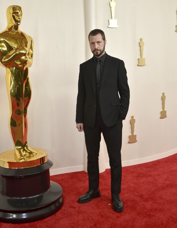 Mstyslav Chernov arrives at the Oscars on Sunday, March 10, 2024, at the Dolby Theatre in Los Angeles. (Photo by Richard Shotwell/Invision/AP)