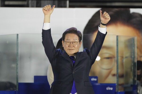 South Korea's Democratic Party's presidential candidate Lee Jae-myung, gestures as his supporters gather outside of the National Assembly in Seoul, South Korea, Wednesday, June 4, 2025. (AP Photo/Lee Jin-man)
