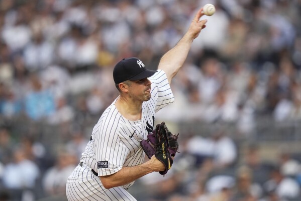 New York Yankees' Carlos Rodón pitches during the first inning of the team's baseball game against the Minnesota Twins, Wednesday, June 5, 2024, in New York. (AP Photo/Frank Franklin II)
