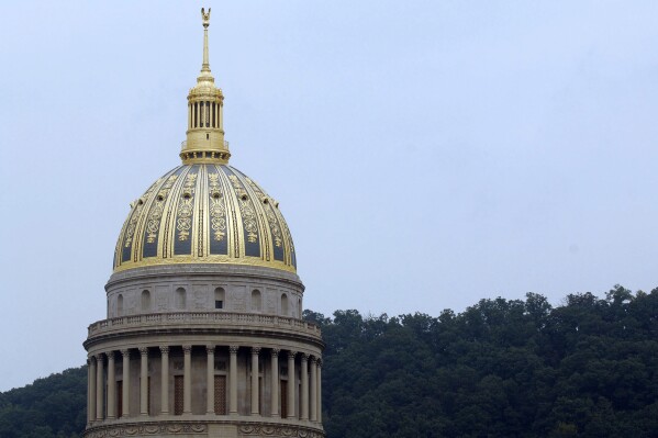 FILE West Virginia's Capitol dome is shown Friday, Oct.1 4, 2005, in Charleston, W.Va. A termination letter from the former secretary for the troubled agency that ran West Virginia's foster care and substance use support services is public information, a state appeals court ruled this week in May 2024, siding with the television station that was denied the information via a records request. (AP Photo/Jeff Gentner, File)