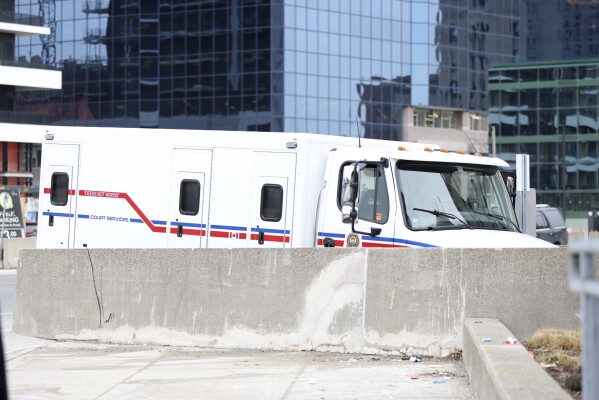 A police vehicle arrives at the London courthouse at the sentencing hearing of Nathaniel Veltman in London, Ont., Thursday, Feb. 22, 2024. (Nicole Osborne /The Canadian Press via AP)