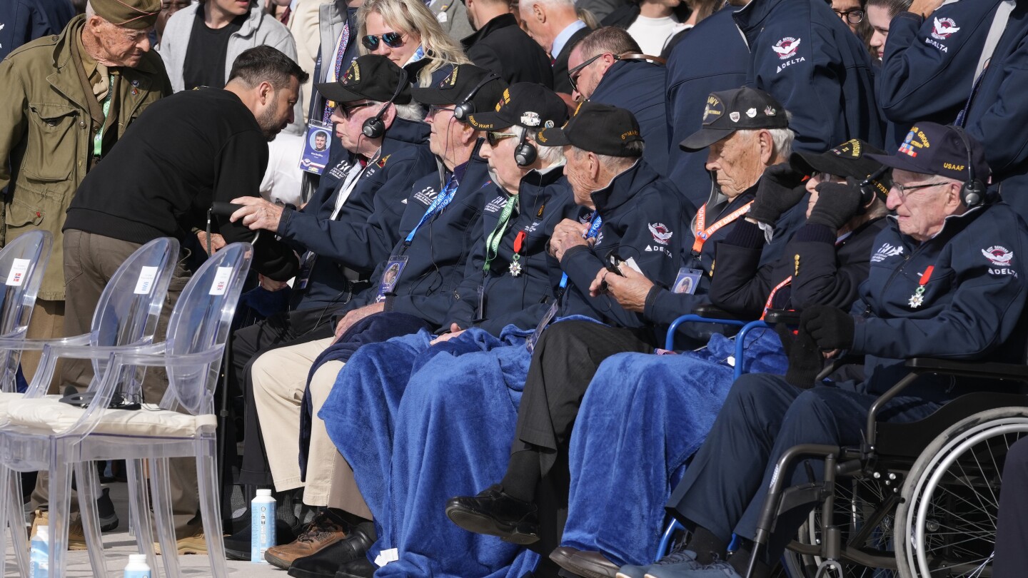 American Veteran Embraces Ukraine’s Zelenskyy at D-Day Ceremony, Praising Him as a Hero