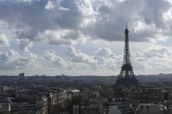 FILE - The Eiffel Tower is pictured from the top of the Arc de Triomphe, Monday, Feb. 12, 2024 in Paris. Visits to the Eiffel Tower were disrupted on Monday Feb.19, 2024 because of a strike over poor financial management of the monument that is one of the world's most-visited sites. (AP Photo/Aurelien Morissard, File