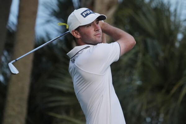 Austin Eckroat hits from the seventh tee during the final round of the Cognizant Classic golf tournament, Sunday, March 3, 2024, in Palm Beach Gardens, Fla. (AP Photo/Marta Lavandier)