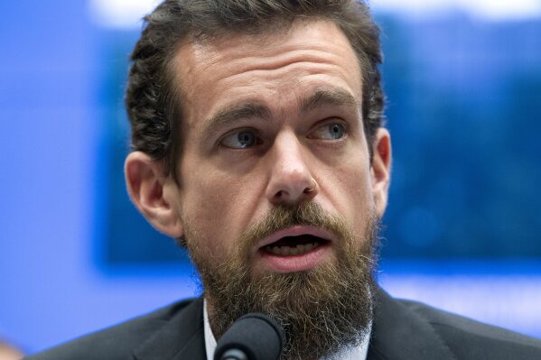 
              Twitter CEO Jack Dorsey testifies before the House Energy and Commerce Committee on Capitol Hill, Wednesday, Sept. 5, 2018, in Washington. Lawmakers have sparred over whether a now-reversed change to auto-suggestions on Twitter had unfairly hurt Democrats or Republicans more. Dorsey isn't saying which, but tells lawmakers he'll follow up.  (AP Photo/Jose Luis Magana)
            