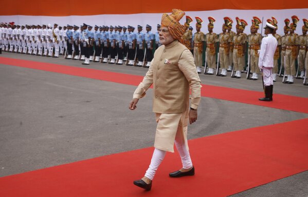 FILE-Indian Prime Minister Narendra Modi arrives at the Red Fort to address the nation on the occasion of Independence Day in New Delhi, India, Aug. 15, 2015. (AP Photo/Saurabh Das, File)