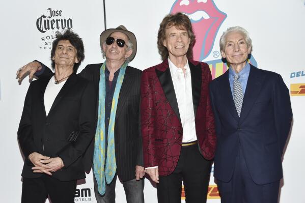 FILE - The Rolling Stones, from left, Ronnie Wood, Keith Richards, Mick Jagger and Charlie Watts attend the opening night party for "Exhibitionism" in New York on Nov. 15, 2016. The Royal Mint is issuing a collectable coin to celebrate the 60th anniversary of The Rolling Stones. (Photo by Evan Agostini/Invision/AP, File)