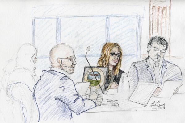 This courtroom sketch, from left, depicts Madison County prosecutor Rob Wood, Lori Vallow Daybell and defense attorney Jim Archibald during opening statements of Vallow Daybell's murder trial in Boise, Idaho, Monday, April 10, 2023. Prosecutors have charged Vallow Daybell and her husband, Chad Daybell, with multiple counts of conspiracy, murder and grand theft in connection with the deaths of Vallow Daybell's two children: Joshua 