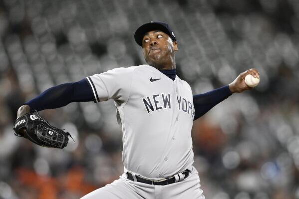 FILE - New York Yankees relief pitcher Aroldis Chapman throws during the ninth inning of a baseball game against the Baltimore Orioles, Monday, May 16, 2022, in Baltimore. The New York Yankees reinstated reliever Aroldis Chapman from the injured list Friday, July 1, 2022, after the left-hander missed more than a month with tendinitis in his left Achilles tendon. (AP Photo/Nick Wass, File)