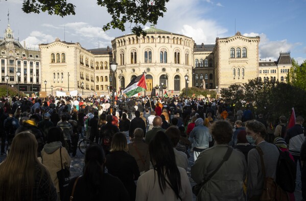 FILE - People gather in support of the Palestinain people, amid the conflict with Israel, in front of the parliament building in Oslo, Norway, on May 19, 2021. European Union countries Spain and Ireland as well as Norway on Wednesday announced dates for recognizing Palestine as a state. (Berit Roald/NTB via AP, File)