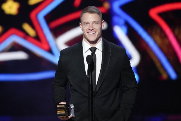 San Francisco 49ers' Christian McCaffrey, AP offensive player of the year speaks during the NFL Honors award show ahead of the Super Bowl 58 football game Thursday, Feb. 8, 2024, in Las Vegas. (AP Photo/David J. Phillip)