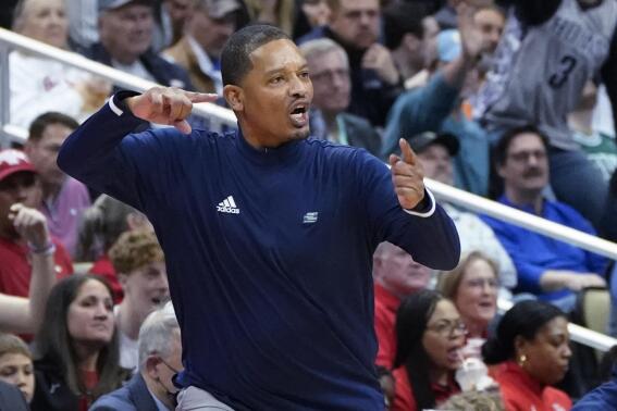 Chattanooga coach Lamont Paris gestures after the ball went out of bounds on a bad pass against Illinois during the second half of a college basketball game in the first round of the NCAA men's tournament Friday, March 18, 2022, in Pittsburgh. (AP Photo/Keith Srakocic)