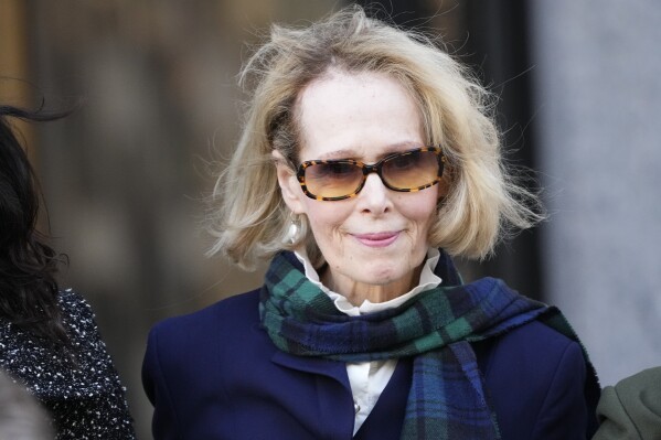 FILE - E. Jean Carroll leaves Manhattan federal court, Oct. 23, 2023, in New York. A federal judge said Sunday, Jan. 14, 2024, that former President Donald Trump can wait a week to testify at a New York defamation trial where he could face millions of dollars in damages after a jury concluded that he sexually abused columnist Carroll in the 1990s. (AP Photo/Frank Franklin II, File)