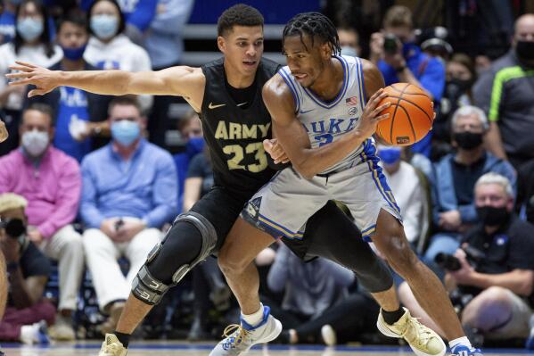 Duke's Jeremy Roach (3) is defended by Army's Aaron Duhart (23) during the first half of an NCAA college basketball game in Durham, N.C., Friday, Nov. 12, 2021. (AP Photo/Ben McKeown)