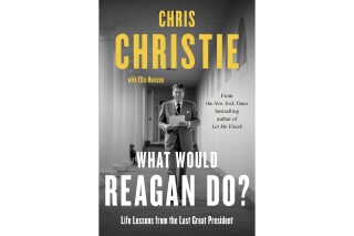 This cover image released by Gallery Books shows "What Would Reagan Do? Life Lessons from the Last Great President" by Chris Christie with Ellis Henican. (Gallery Books via AP)