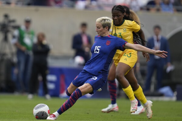 United States forward Megan Rapinoe kicks toward the goal but misses during the first half of a soccer game against South Africa, Sunday, Sept. 24, 2023, in Chicago. (AP Photo/Erin Hooley)