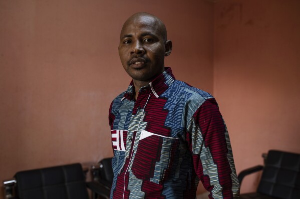 FILE - Daouda Diallo, one of Burkina Faso's most prominent human rights defenders poses for a photograph, in Ouagadougou, Burkina Faso, Thursday Feb. 3, 2022. Daouda Diallo — who won the Martin Ennals awards for human rights in 2022 — was taken to an unknown location by men who accosted him in the nation's capital city on Friday, Dec. 1, 2023 the local civic group which Diallo founded said in a statement. (AP Photo/Sophie Garcia, File)