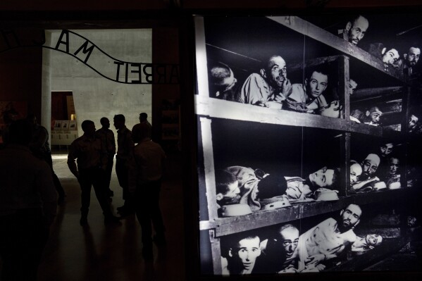 People visit the Yad Vashem Holocaust Memorial Museum in Jerusalem, Sunday, May 5, 2024. The annual Israeli memorial day for the 6 million Jews killed in the Holocaust of World War II begins at sundown on Sunday. (AP Photo/Ohad Zwigenberg)