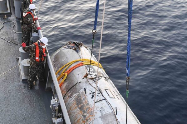 FILE - This photo provided by South Korea's Defense Ministry shows an object salvaged by South Korea's military that is presumed to be part of the North Korean space-launch vehicle that crashed into sea following a launch failure, in West Sea, South Korea, on June 15, 2023. (South Korea Defense Ministry via AP, File)