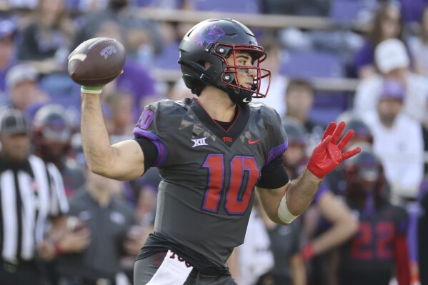 TCU quarterback Josh Hoover throws downfield against Baylor in the first half of an NCAA college football game, Saturday, Nov. 18, 2023, in Fort Worth, Texas. (Rod Aydelotte/Waco Tribune-Herald via AP)