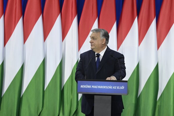 Hungary's Prime Minister Viktor Orban delivers his annual "State of Hungary" speech in Budapest, Hungary, Saturday, Feb. 17, 2024. The message on lectern reads: "For us Hungary is the first!" (Szilard Koszticsak/MTI via 番茄直播)